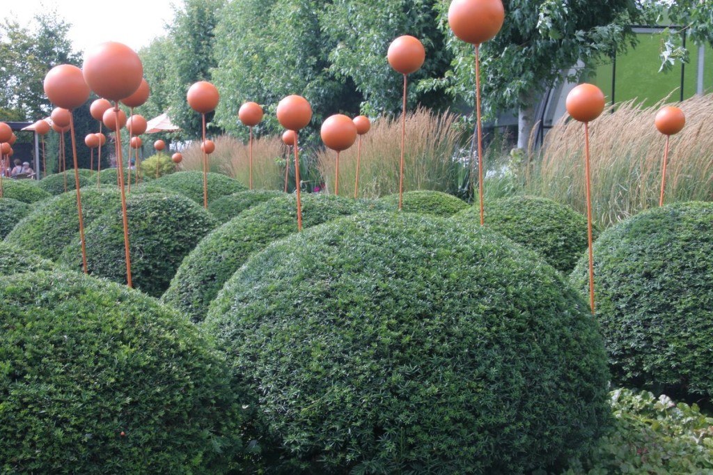 Orange Spheres and 'Karl Forerster' at Appeltern Garden