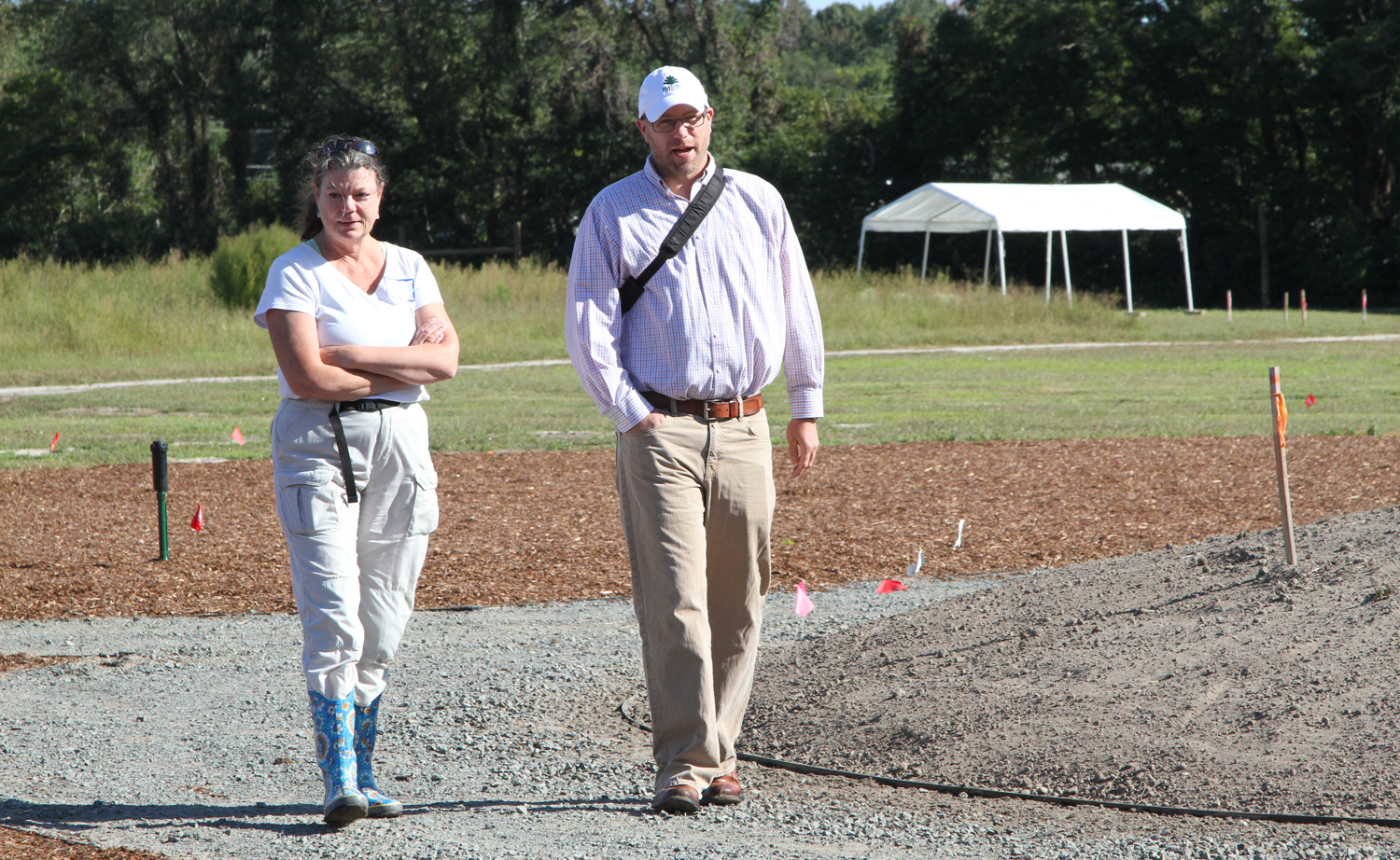DBG Board Member Janet Point discusses the meadow with Richard Olsen, Director of the US National Arboretum.