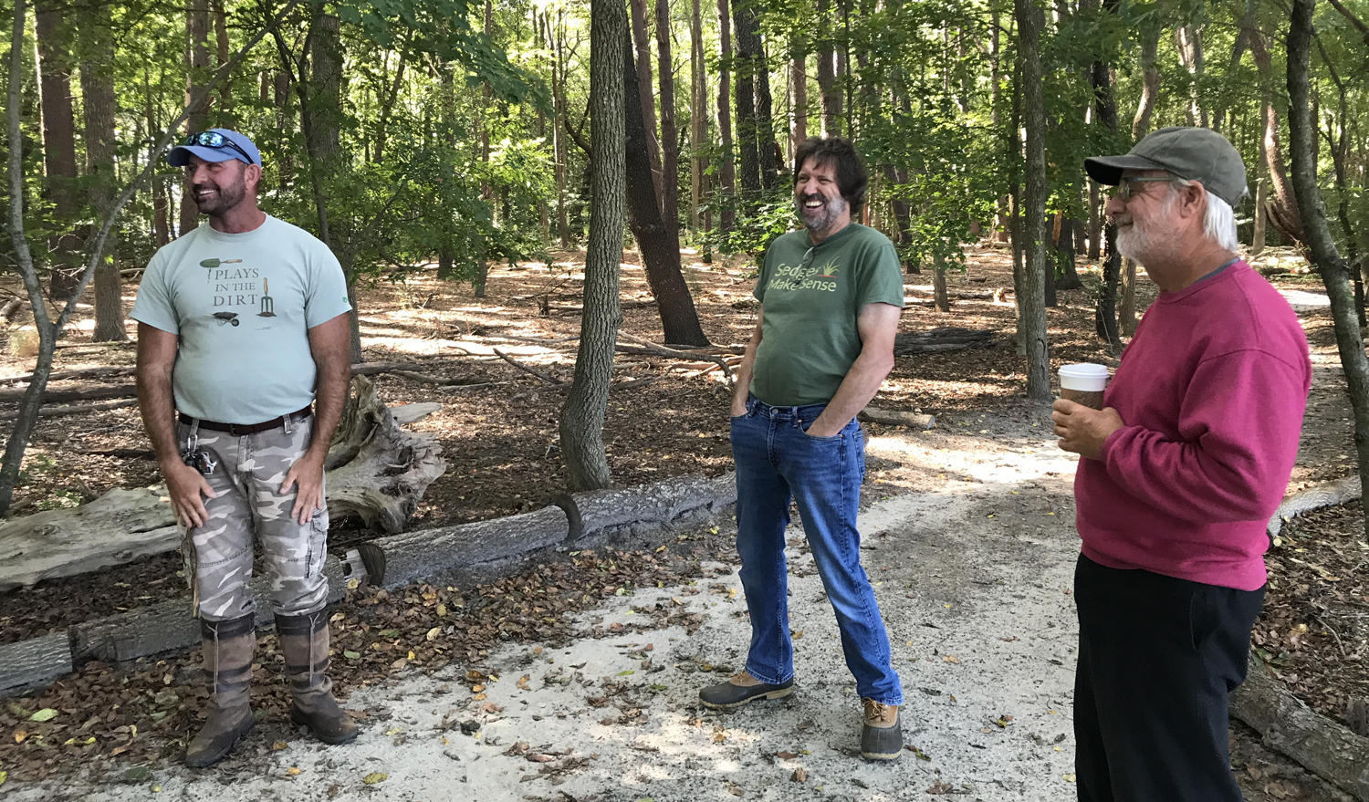 John Hoffman, Roy Diblik (R) and others took a tour of the nearby DBG woodlands with Gregg Tepper (L).
